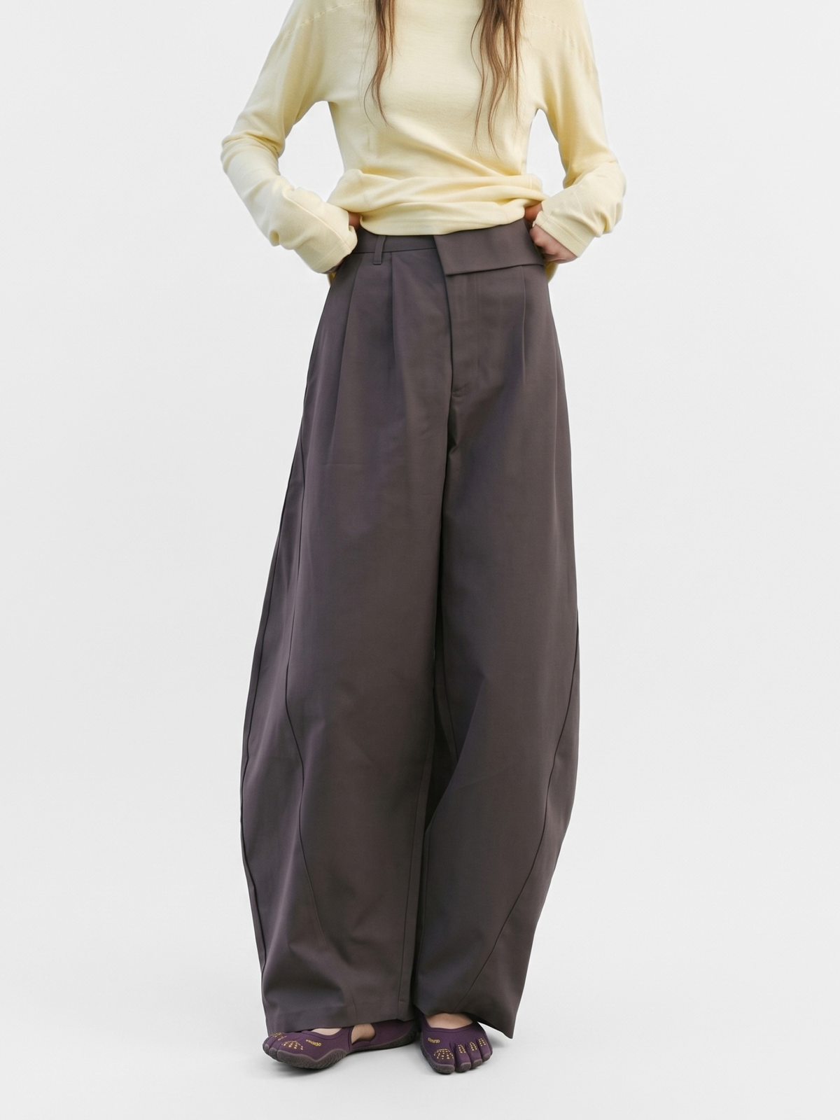 PleatMist - Irregular Pleated Waist Curved-Leg Pants