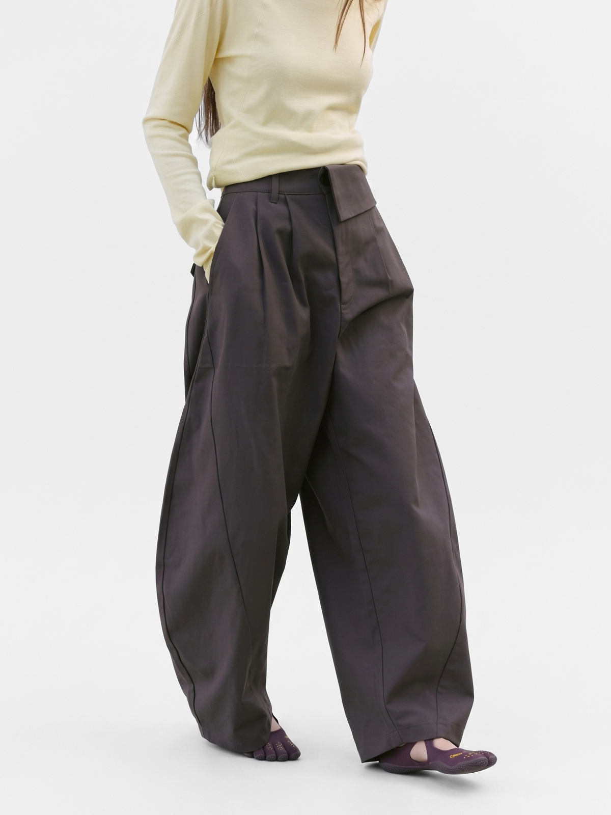 PleatMist - Irregular Pleated Waist Curved-Leg Pants